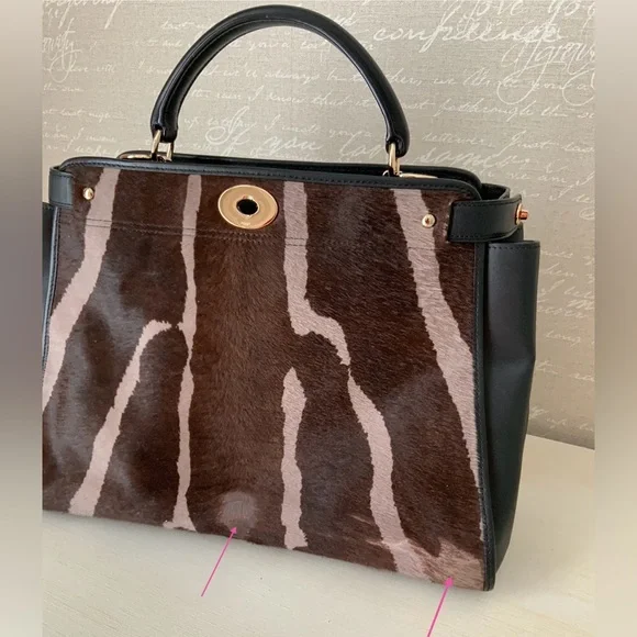 Coach,calf hair and leather top handle
Bag - Picture 12 of 14